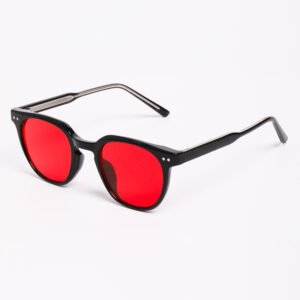 A pair of red light glasses for sleep with a glossy black frame and bright red lenses, displayed at a three-quarter angle against a plain white background.